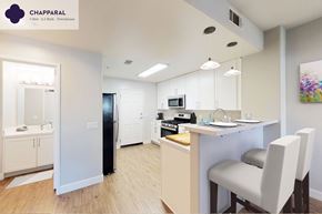 Camarillo apartment for rent - A well-lit kitchen with a dining table and chairs at Mission Hills, Camarillo, 93012