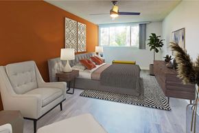 Los Angeles apartment for rent - a bedroom with an orange accent wall and a bed at Casa Granada, Los Angeles, 90049