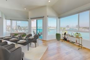Marina Del Rey apartment for rent - A dining room with a table set for six with a view of the city at Esprit Marina del Rey, 90292