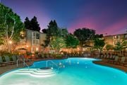 Culver City apartment for rent - A swimming pool with a few people in it at night at The Meadows Apartments, Culver City , CA 90230