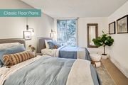 Culver City apartment for rent - A bedroom with two beds and a plant at The Meadows Apartments, Culver City , CA 90230