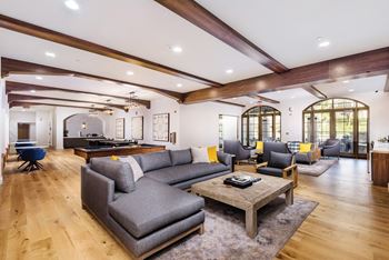 A living room with a couch and a coffee table