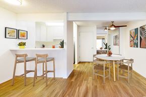 Northridge apartment for rent - A dining room with a table and chairs at Village Pointe Apartments, Northridge, California