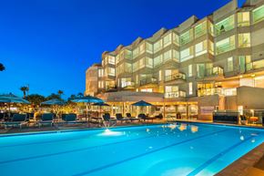 Marina Del Rey apartment for rent - A large pool in front of a building with a sign that says at Esprit Marina del Rey, 90292