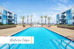 Marina Del Rey apartment for rent - A large swimming pool in front of a building with the name Waters Edge at Marina Harbor, California, 90292