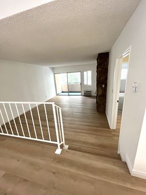 Los Angeles apartment for rent - Living Room with Hardwood Floors, Fireplace and Patio Door