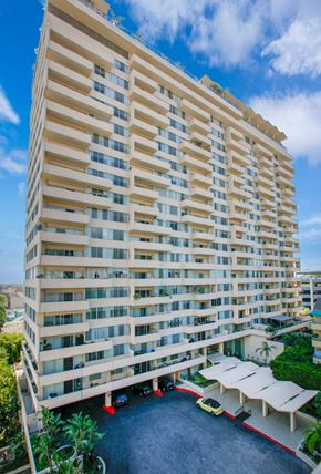 Los Angeles apartment for rent - A tall building with a lot of windows and balconies.