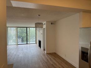 West Hollywood apartment for rent - Living Room with Hardwood Floors, Fireplace and Patio Door
