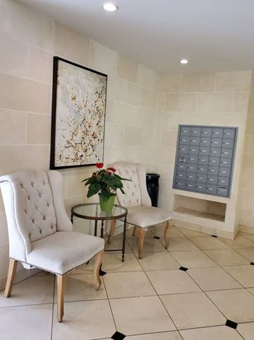 Los Angeles apartment for rent - a living room with two chairs and a table
