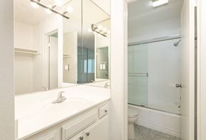 Los Angeles apartment for rent - Bathroom with White Cabinets and Bathtub/Shower