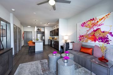 Hutto apartment for rent - a living room with a couch and a table