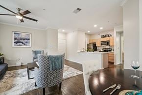 San Antonio apartment for rent - A modern dining room with a wooden table and chairs.