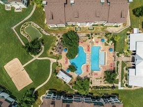 Hutto apartment for rent - Aerial view of resort style pool and recreation area at The Fairways at Star Ranch Apartments, Hutto, TX 78634