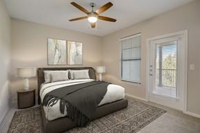 Austin apartment for rent - a bedroom with a bed and a ceiling fan at The Vista on Brodie, Texas, 78745