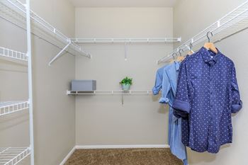 Walk in closet with racks