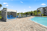 Tampa apartment for rent - Pool With Lounge Chairs at The Oasis at Highwoods Preserve, Florida, 33647