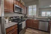 Henderson apartment for rent - Kitchen with Wooden Cabinets at The Summit by Picerne Apartments, Henderson, 89052