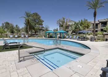 Outdoor pool with hot tub 