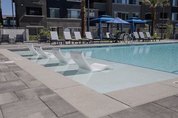Swimming pool with lounge chairs