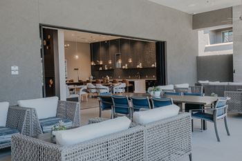 Indoor/outdoor patio to clubhouse with lots of seating