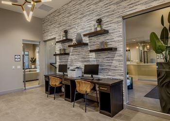 Resident business center with two computer work stations and printer