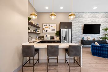 Clubhouse with free wifi, flat screen tvs, and coffee bar