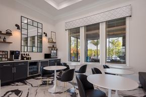 Bradenton apartment for rent - a room filled with furniture and a large window  at The Oasis at Manatee River, Bradenton, FL, 34211