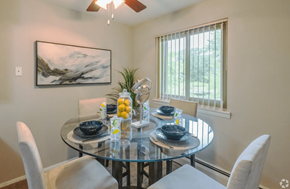 Warwick apartment for rent - A dining room with a glass table and chairs.