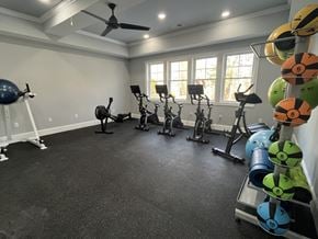 Warwick apartment for rent - A spacious home gym with a variety of exercise equipment.