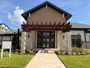 Zephyrhills apartment for rent - A building with a sign that says Welcome Center.