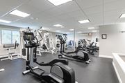 Warwick apartment for rent - A gym with treadmills, elliptical machines, and other exercise equipment.