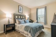 Orlando apartment for rent - Bedroom With Expansive Windows at The Oasis at Moss Park Preserve, Orlando, 32832