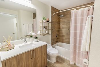 Renovated bathrooms with quartz counters