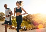 Alexandria apartment for rent - A man and a woman are jogging on a road.