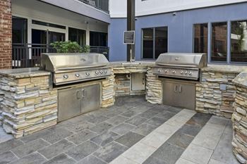 Outdoor dining area with gourmet grilling station