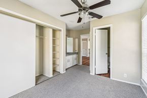 San Antonio apartment for rent - Modern bedroom with carpet and ceiling fan at Bandera Crossing apartments in San Antonio, TX