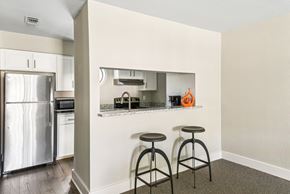 San Antonio apartment for rent - Clubhouse kitchen with island bar at Bandera Crossing apartments in San Antonio, TX