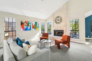 San Antonio apartment for rent - a living room with a couch and chairs and a fireplace