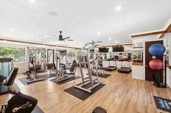 Fully equipped fitness center with free weights