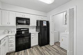 Plano apartment for rent - Model unit kitchen at Chisholm Place in Plano, TX