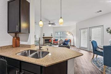 Austin apartment for rent - A kitchen with a sink and a counter.