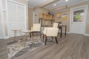 Shreveport apartment for rent - A leasing office with a rug and chairs  at The Creole Apartments in Shreveport, LA