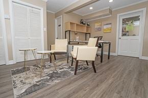 Shreveport apartment for rent - A leasing office with a rug and chairs  at The Creole Apartments in Shreveport, LA