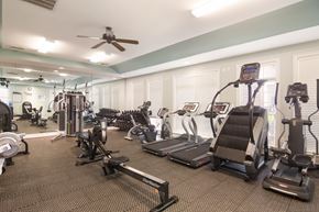 Pensacola apartment for rent - Fully equipped gym with modern workout machines at Angel Landing apartments in Pensacola, FL