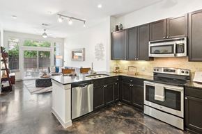Houston apartment for rent - Model kitchen with stainless steel appliances at Harlow River Oaks in Houston, TX