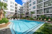 Houston apartment for rent - Swimming pool with lounge seating at Harlow River Oaks in Houston, TX