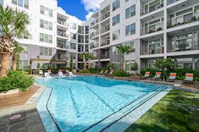 Houston apartment for rent - Swimming pool with lounge seating at Harlow River Oaks in Houston, TX