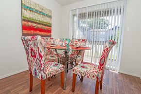 Shreveport apartment for rent - A dining room with a table and chairs at Laurel Parc apartments in Shreveport, LA.