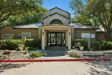 Plano apartment for rent - The front of a building with a sign that says "Casa" on it.