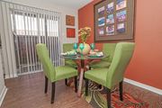 Shreveport apartment for rent - Model dining room next to the patio doors at Magnolia apartments in Shreveport, LA